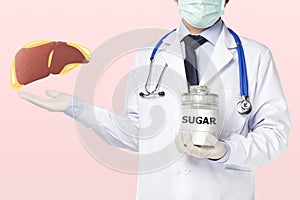 Doctor showing fatty liver and sugar photo