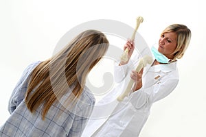 Doctor showing pacient how she has broken her bones