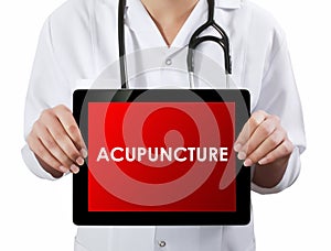 Doctor showing tablet with ACUPUNCTURE text.