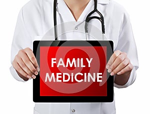 Doctor showing tablet with FAMILY MEDICINE text.