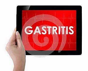 Doctor showing tablet with GASTRITIS text.