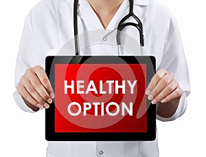 Doctor showing tablet with HEALTHY OPTION text.
