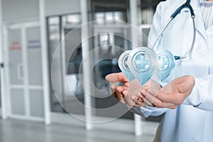 Doctor shows in his hands the locations of medical institutions