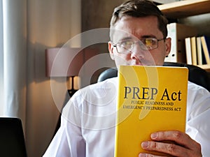 The doctor shows Public Readiness and Emergency Preparedness PREP Act. photo