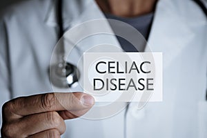 Doctor and signboard with text celiac disease