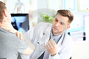 Doctor speaking with man