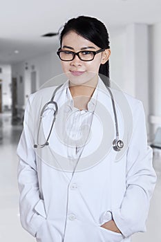 Doctor standing in corridor