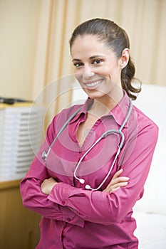 A Doctor Standing In A Hospital Ward