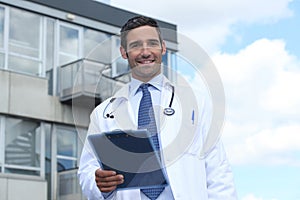 Doctor standing outside hospital