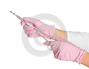 Doctor in sterile gloves with medical forceps