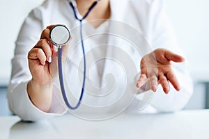 Doctor with stethoscope doing surprise gesture