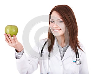 Doctor with stethoscope holding green apple..