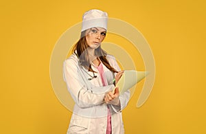 Doctor with stethoscope at hospital. Girl with folder. Medical documents. Nurse hold patient medical chart. Information