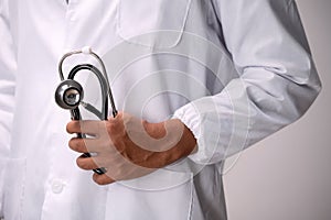 Doctor with stethoscope isolated white background