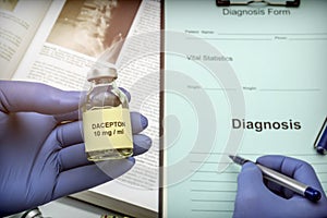 Doctor subject vial with medication for Parkinson`s disease in a hospital