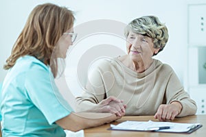 Doctor supporting a patient