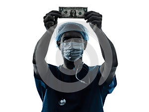Doctor surgeon man examing dollar bill silhouette