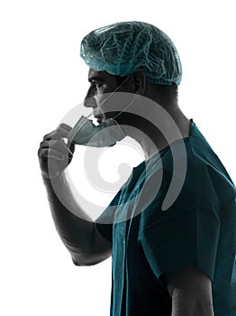 Doctor surgeon man portrait with face mask silhouette