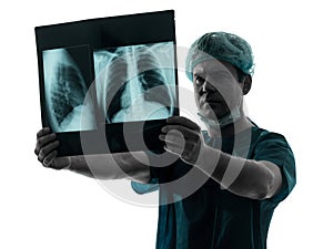 Doctor surgeon radiologist examaning lung torso x-ray image