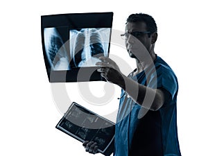 Doctor surgeon radiologist examining lung torso x-ray image