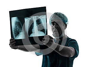 Doctor surgeon radiologist surprised examining lung torso x-ra