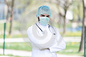 Doctor With Surgical Mask and Gloves Outside