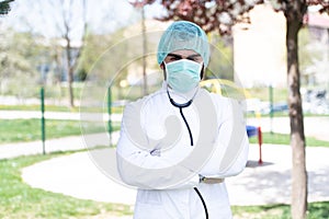 Doctor With Surgical Mask and Gloves Outside