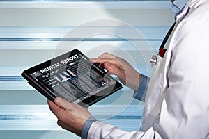 Doctor with tablet data consulting a medical report of a patient