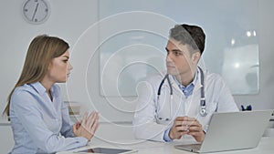 Doctor Talking with Patient, Discussing Health Treatment Plan