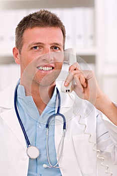 Doctor talking on phone