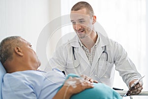 Doctor talking to patient about medical treatment after surgery