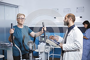 Doctor talking to senior patient