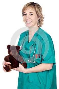 Doctor with a teddy bear