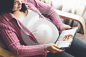 Doctor telemedicine service online video with pregnant woman for prenatal care