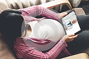 Doctor telemedicine service online video with pregnant woman for prenatal care