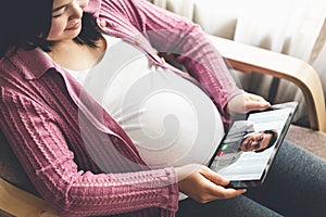 Doctor telemedicine service online video with pregnant woman for prenatal care