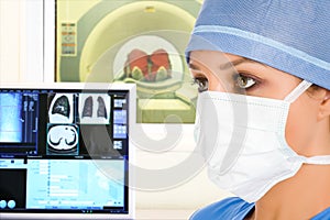 Doctor and tomographic scanner in hospital