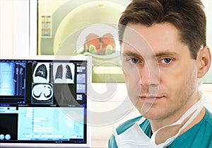 Doctor and tomographic scanner in hospital