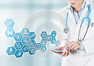 Doctor touching medical buttons on mobile