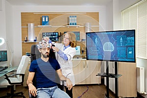 Doctor tracking data transmitted by brainwaves scanning headset