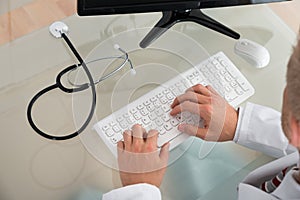 Doctor Typing On Keyboard