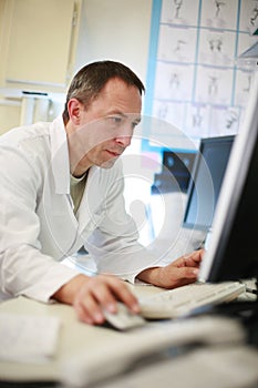 Doctor using computer photo