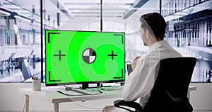 Doctor Using Desktop Computer