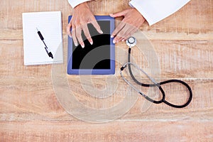 Doctor using digital tablet