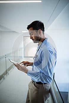 Doctor using digital tablet