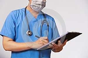 Doctor using digital tablet find information patient medical history at the hospital.