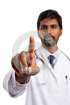 Doctor using finger to touch invisible screen
