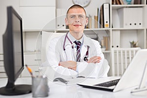 doctor using laptop computer working at desk