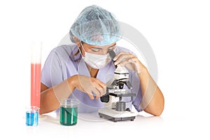 Doctor using microscope