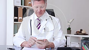 Doctor is using smart phone